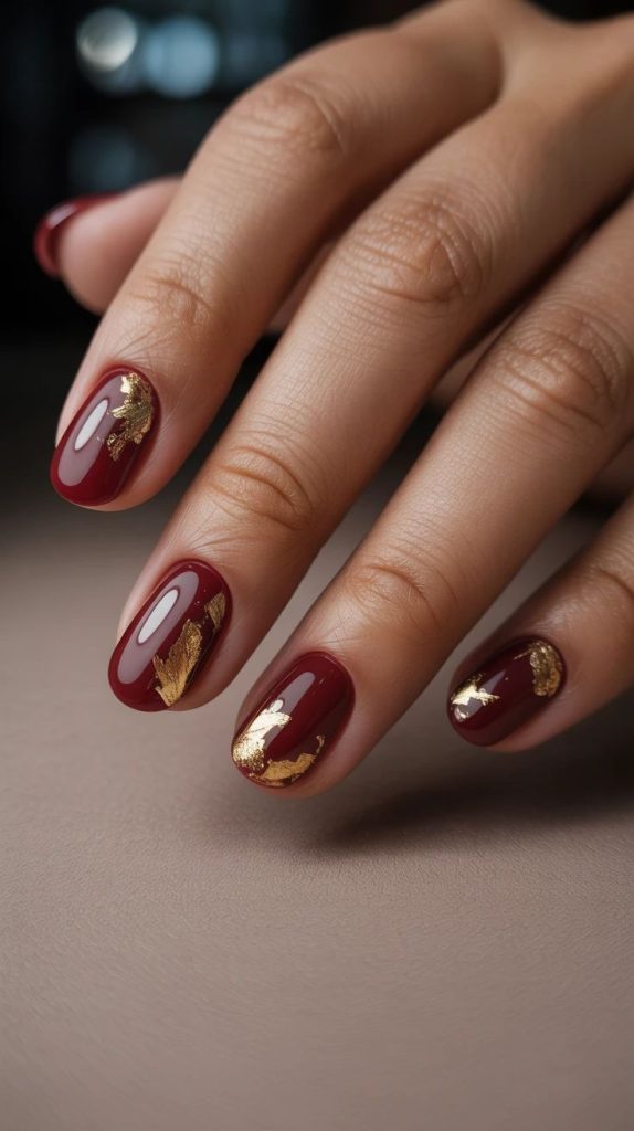 Burgundy Nails with Gold Foil Touch